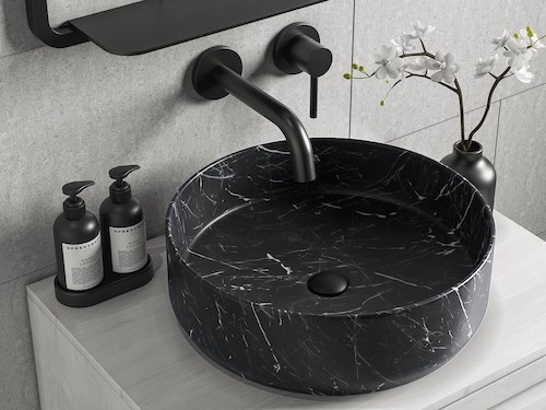 Lavabo sobre encimera de mármol negro Marquina